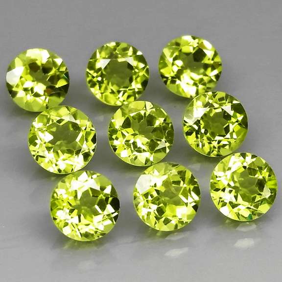 Dazzling 7.98ct untreated apple green Peridot set