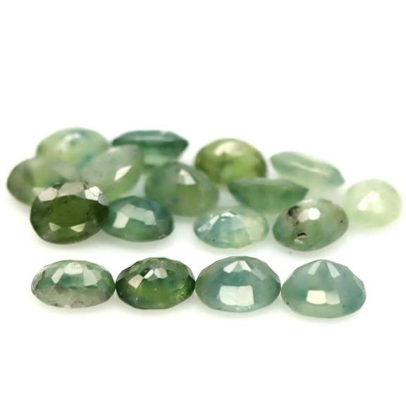 Fantastic 8.20ct green Sapphire set