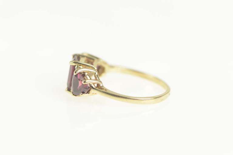 10K Yellow Gold Emerald Garnet Trillion Accent Three Stone Ring