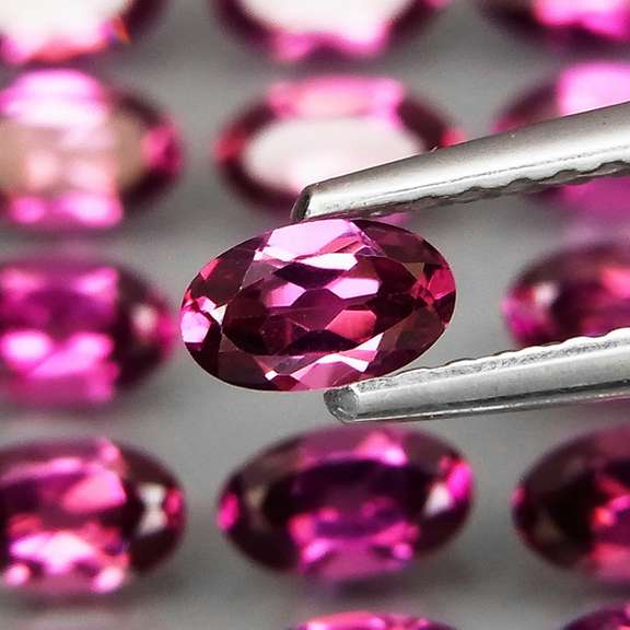 Ravishing 8.80ct violet pink Rhodolite Garnet set