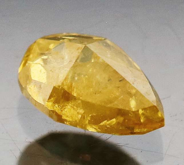 Rare .39ct pear cut yellow Diamond