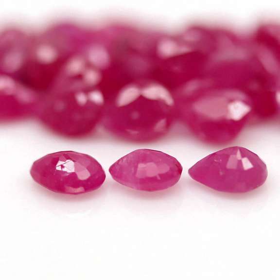 Heated only! 11.94ct pear cut pink Ruby set