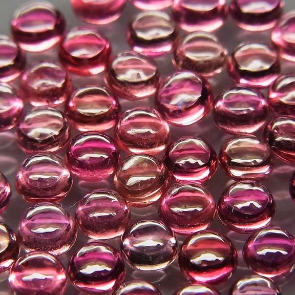 Fancy colored 4.55ct Songean Sapphire cabochon parcel