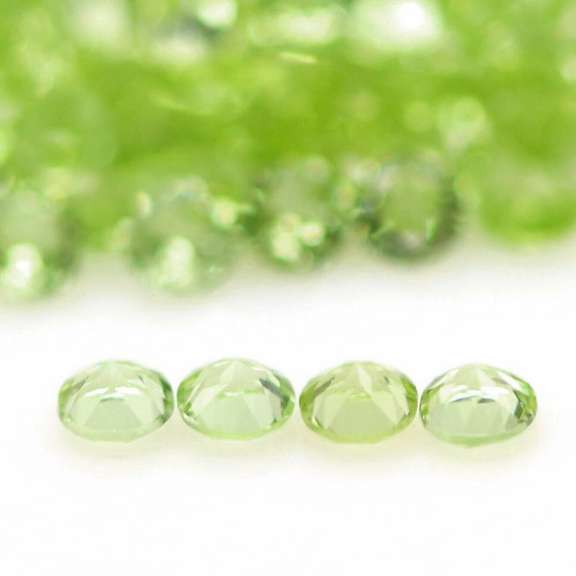 Fantastic 12.20ct round brilliant cut Peridot set