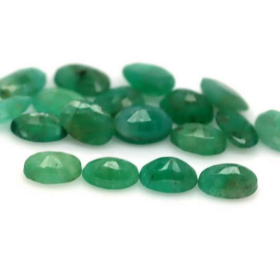 Heavy 7.65ct 18 piece Zambian Emerald set