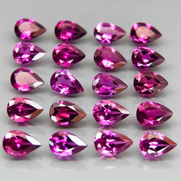 Ravishing 8.99ct violet pink Rhodolite Garnet set