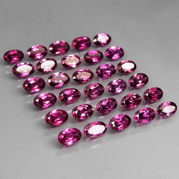Ravishing 8.80ct violet pink Rhodolite Garnet set