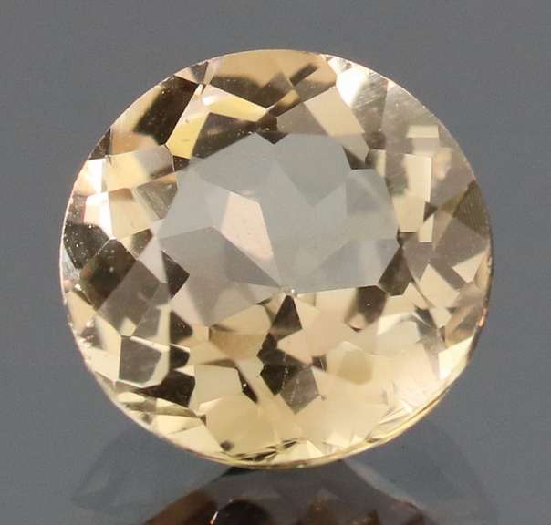 Exciting 3.11ct 9mm champagne Imperial Topaz solitaire