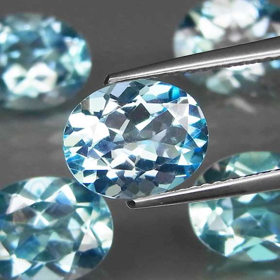 Large 15.62ct vivid Swiss blue Topaz set