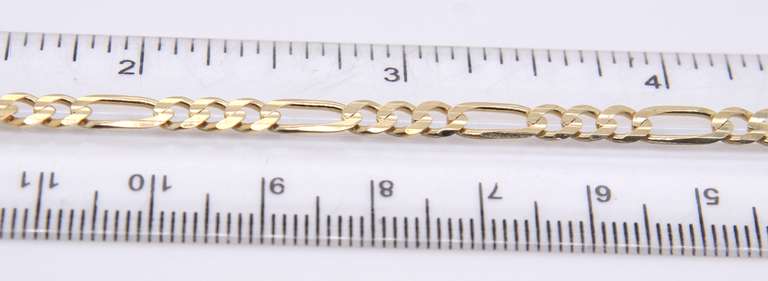 Charming Yellow Gold Figaro Link Bracelet