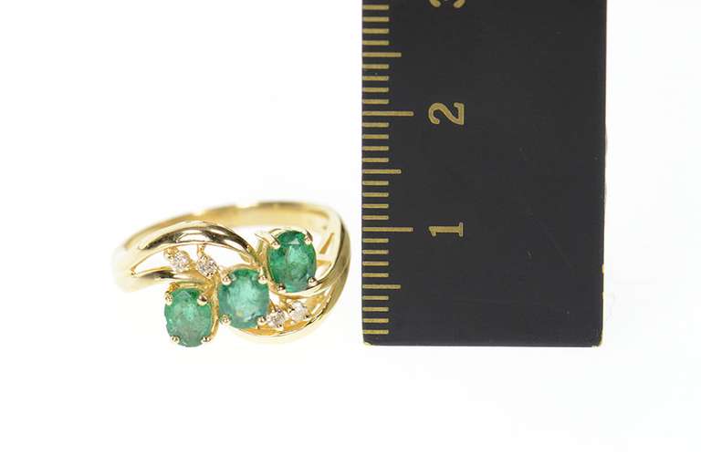 14K Yellow Gold 1.01 Ctw Oval Emerald Diamond Bypass Ring