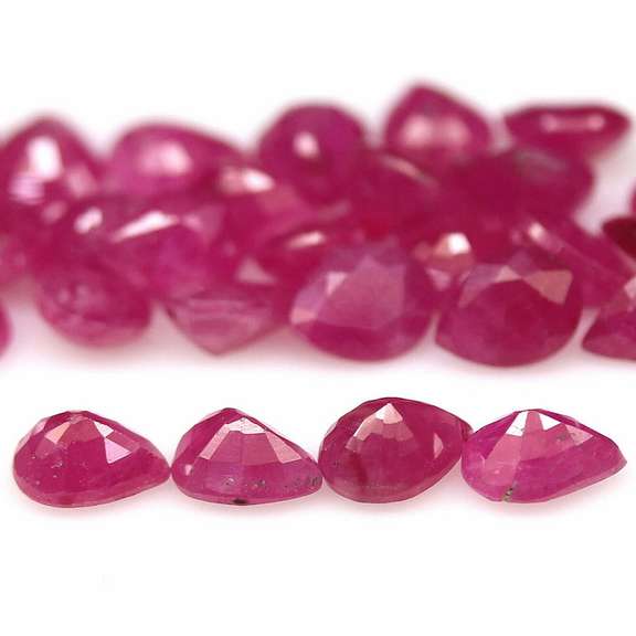Heated only! 12.15ct violet red Ruby set