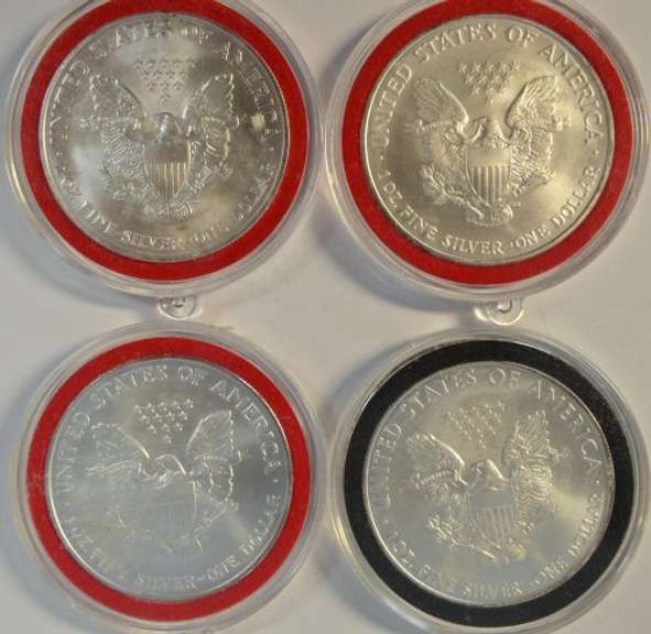 4 Diff. Superb Gem BU $1 Silver Eagles in custom capsules