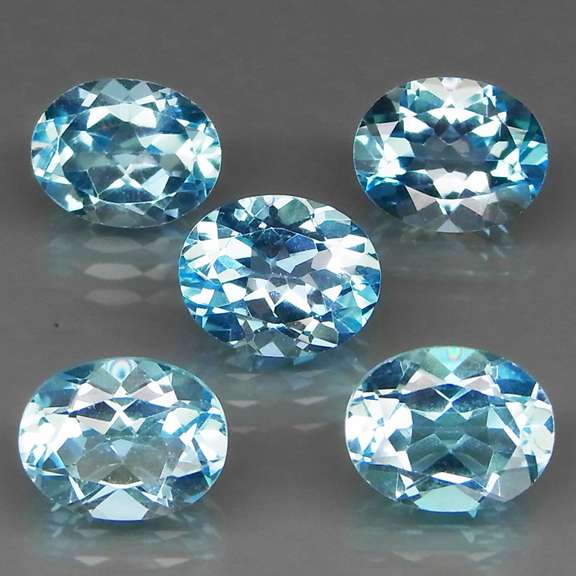 Large 15.62ct vivid Swiss blue Topaz set