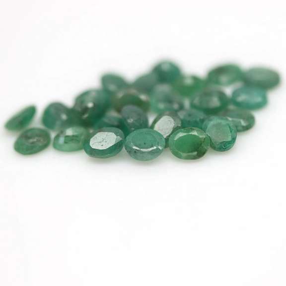 Rich green unheated 8.44ct 5x4mm Emerald set