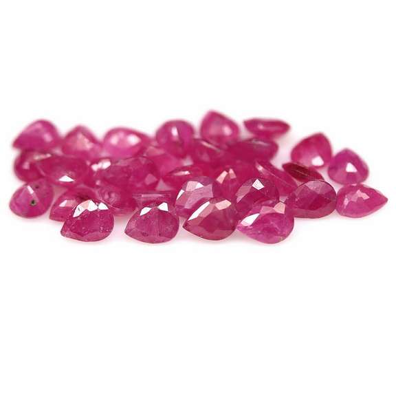 Heated only! 12.15ct violet red Ruby set