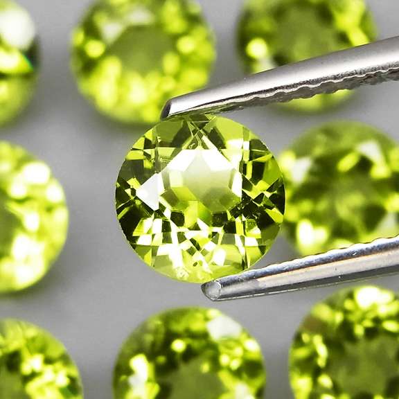 Dazzling 7.98ct untreated apple green Peridot set