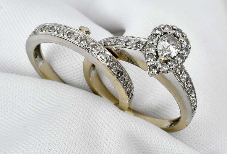 Contemporary Pear Shaped Diamond Wedding Set