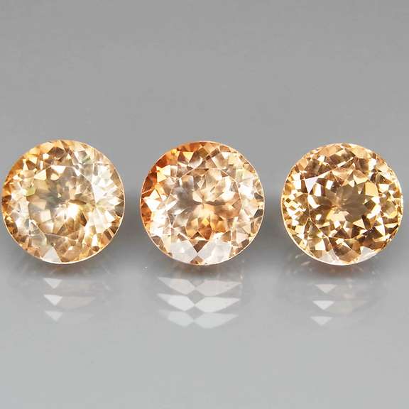 Matched! 3 piece 15.85ct full fire Imperial Topaz set