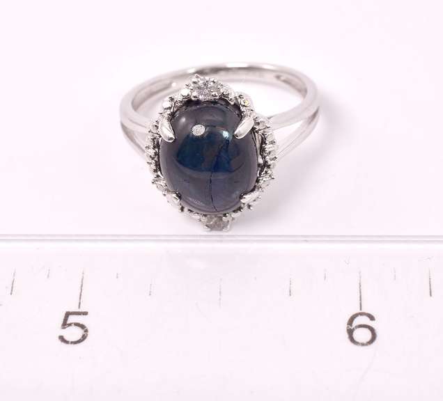 Wonderful 6.65CTS Sapphire and 0.09CTW Diamond Ring in Sterling Silver