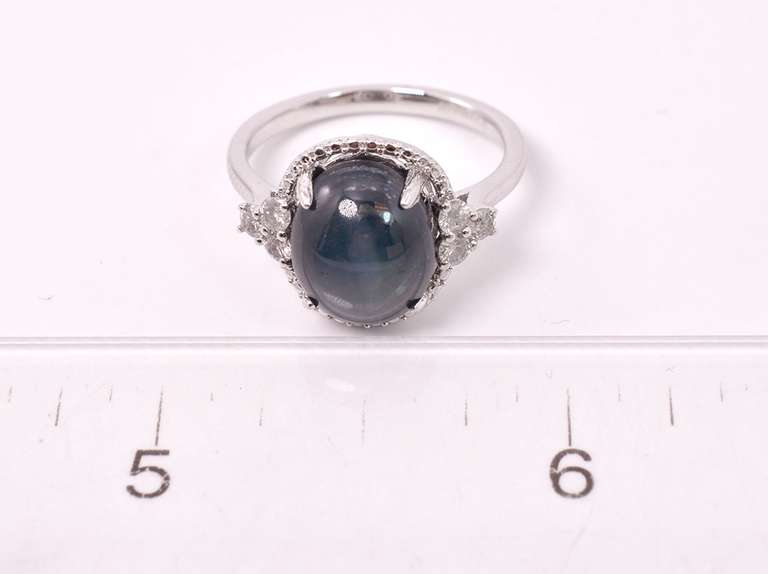 Beautiful 5.96CTS Cabochon-Cut Star Sapphire and 0.29CTW Diamond Ring in Sterling Silver