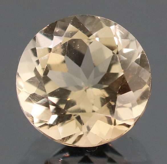 Exciting 3.34ct 9mm champagne Imperial Topaz solitaire