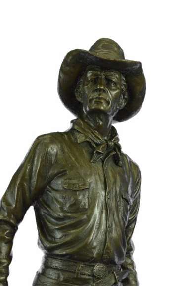 Cowboy with Saddle and Gun Bronze Sculpture