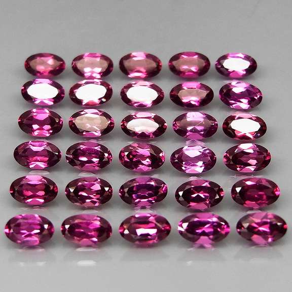 Ravishing 8.80ct violet pink Rhodolite Garnet set