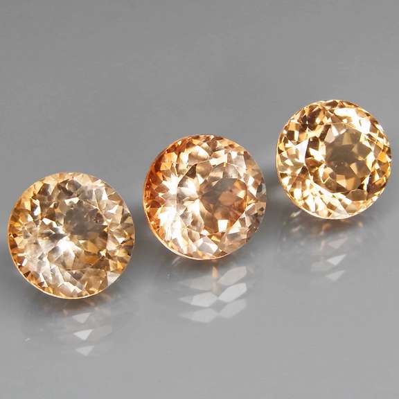 Matched! 3 piece 15.85ct full fire Imperial Topaz set