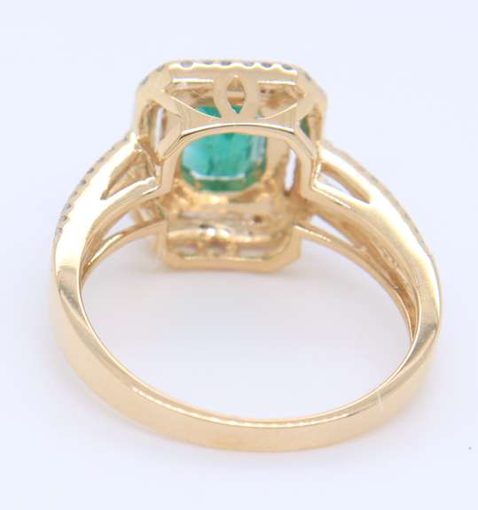 Attractive Emerald Cut Emerald in Double Halo Diamond Setting