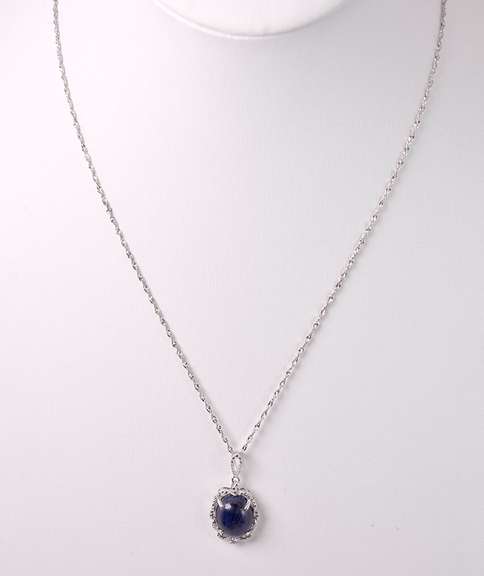 Dazzling 9.16CTS Cabochon-Cut Star Sapphire and 0.05CTW Diamond Pendant Necklace in Sterling Silver