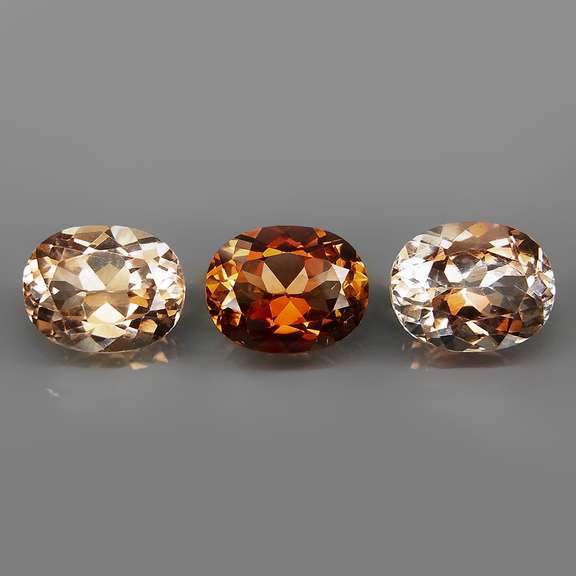 Matched! 3 piece 9.78ct full fire Imperial Topaz set