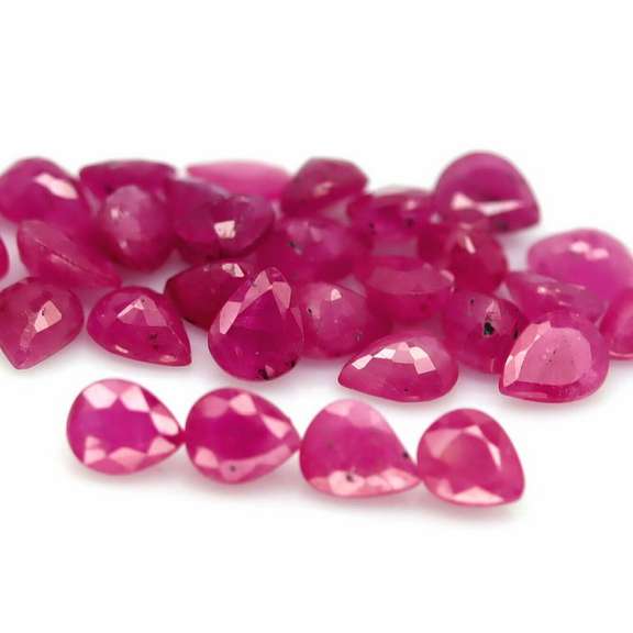 Heated only! 12.36ct violet red Ruby set