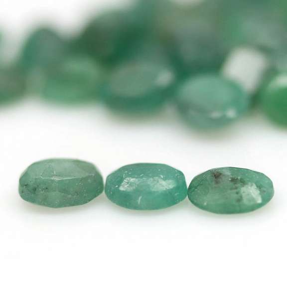 Rich green unheated 8.44ct 5x4mm Emerald set