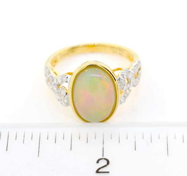 Opulent 2.44 CT Opal & .48 CTW Diamond Ring