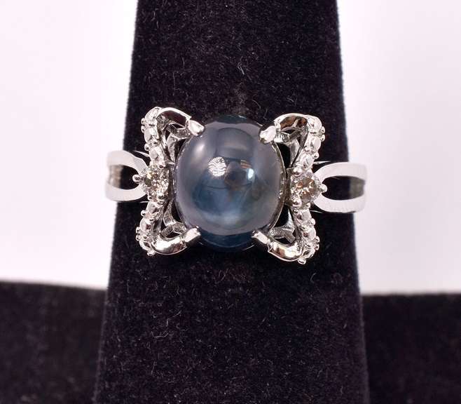 Dazzling 4.78CTS Star Sapphire and 0.10CTW Diamond Ring in Sterling Silver