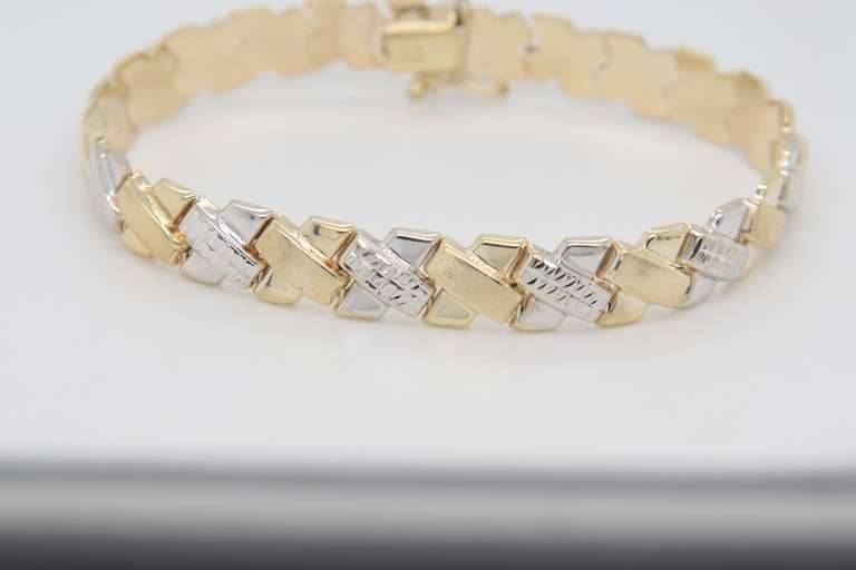 Handsome Two Tone Gold X Bracelet