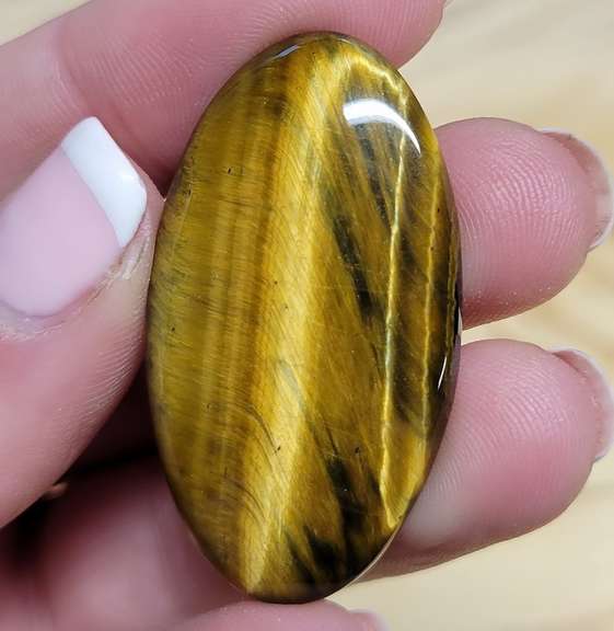 Unique! 42.81ct Golden Tiger Eye cabochon