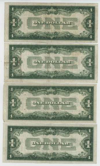 4 Nice circ Series of 1928-A & B $1 Silver Certificates