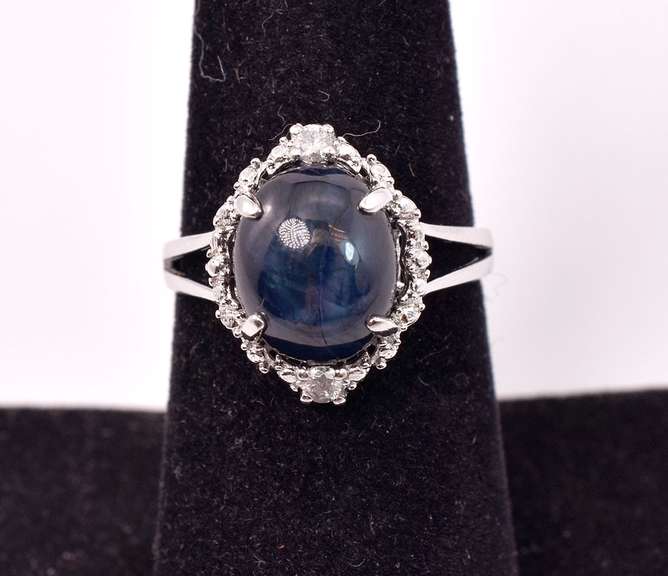 Wonderful 6.65CTS Sapphire and 0.09CTW Diamond Ring in Sterling Silver