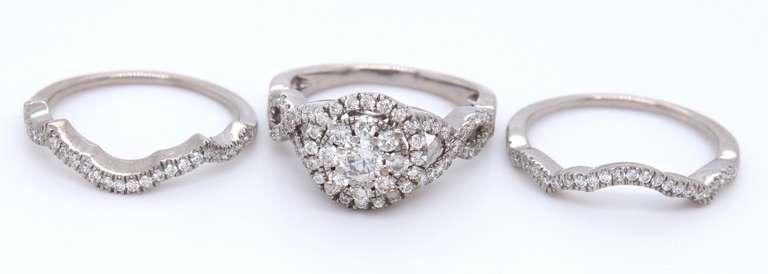Impressive White Gold Diamond Halo Bridal Set