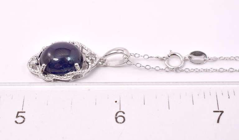 Fantastic 9.71CTS Cabochon-Cut Star Sapphire & 0.11CTW Diamond Pendant Necklace in Sterling Silver