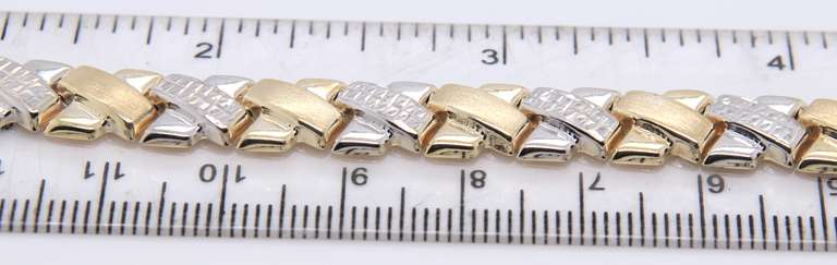 Handsome Two Tone Gold X Bracelet