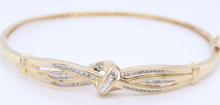 Pleasing Yellow Gold Diamond Baguette Crossover Bangle Bracelet
