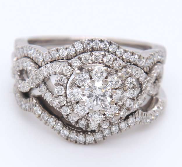 Impressive White Gold Diamond Halo Bridal Set