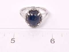 Gorgeous 6.65CTS Cabochon Cut Star Sapphire & 0.09CTW Diamond Ring in Sterling Silver
