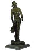 Cowboy with Saddle and Gun Bronze Sculpture