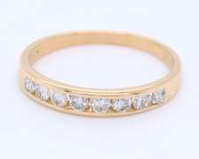 Favorite Yellow Gold Channel Set Diamond Band