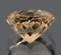 Exciting 3.34ct 9mm champagne Imperial Topaz solitaire