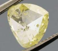 Amazing .60ct pear cut canary yellow Diamond